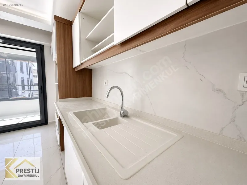 MURATBEY MAHALLESİ HAVUZ CEPHE SİTE İÇİ SATILIK 3+1 LÜKS DAİRE - 2