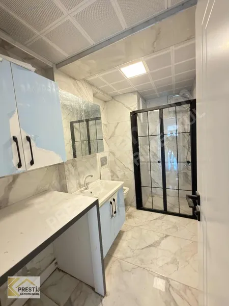 TORBALI MURATBEY'DE ULTRA LÜX SATILIK 2+1 DAİRE MERKEZİ KONUMDA - 24