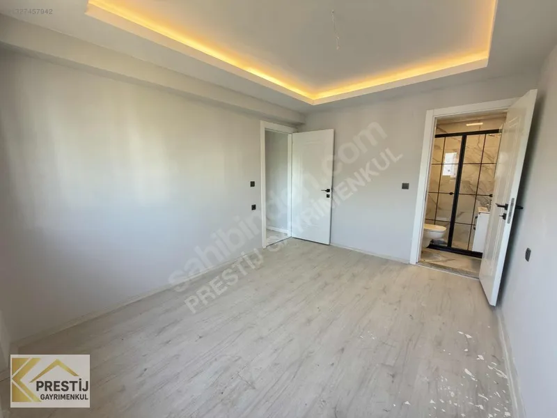 TORBALI MURATBEY'DE ULTRA LÜX SATILIK 2+1 DAİRE MERKEZİ KONUMDA - 31