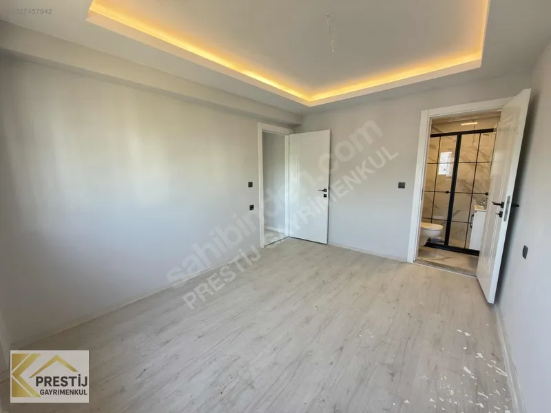 TORBALI MURATBEY'DE ULTRA LÜX SATILIK 2+1 DAİRE MERKEZİ KONUMDA - 32